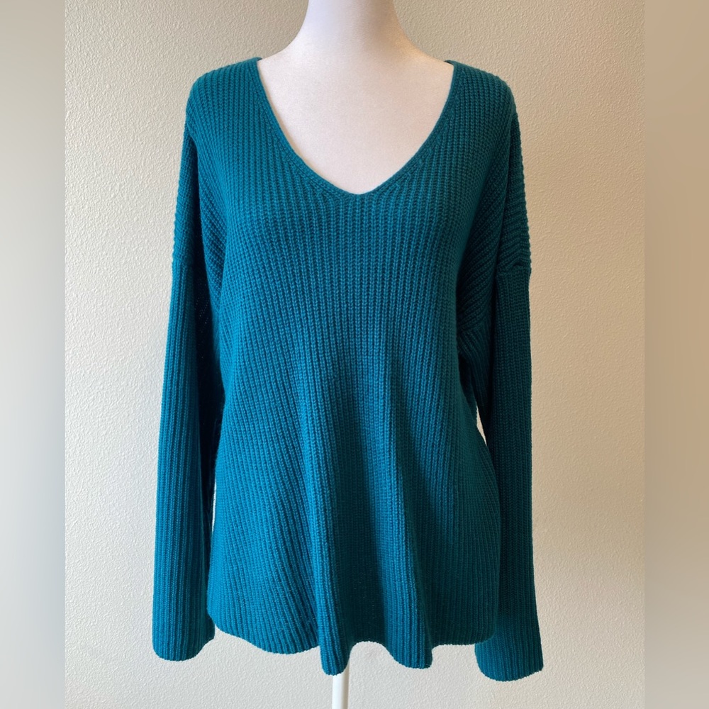 Rue21 blue knit sweater. Criss cross back with velvet-est tie. XL